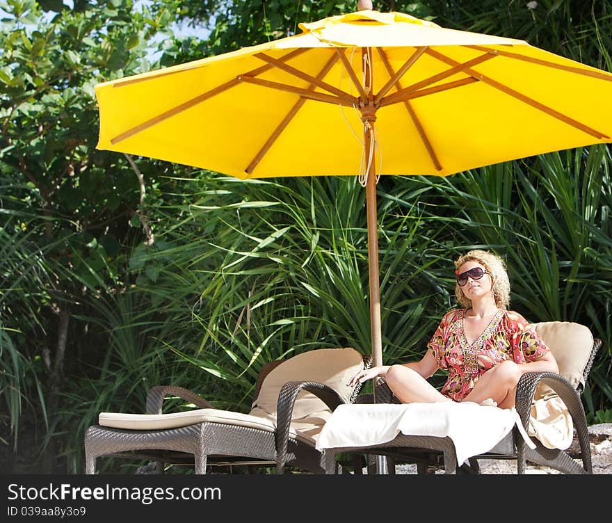 Beautiful Woman Resting On Natural Background