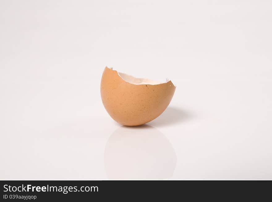 Broken chicken egg shell over the white background. Broken chicken egg shell over the white background