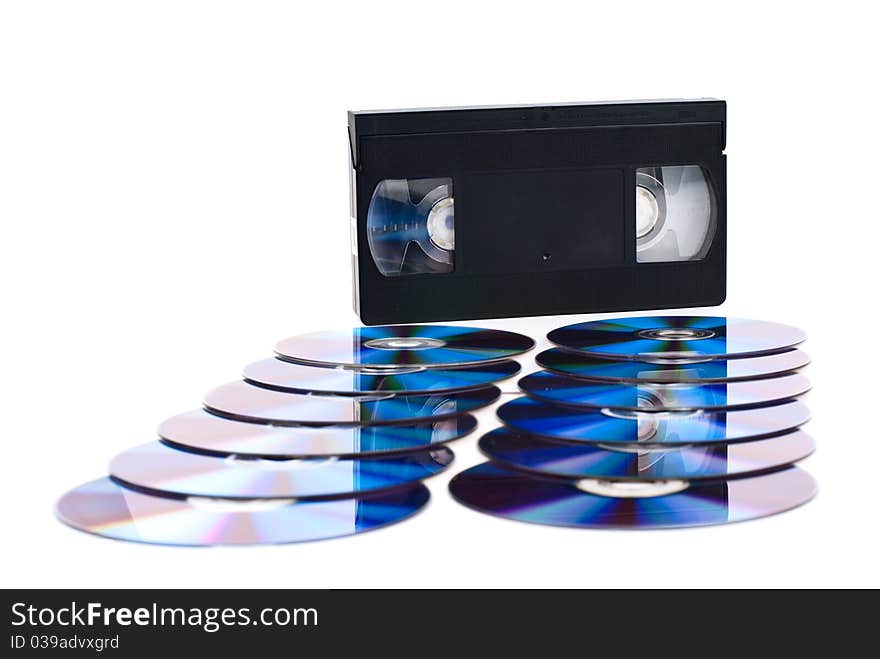 CDs and video tape. White background. Studio shot. CDs and video tape. White background. Studio shot.