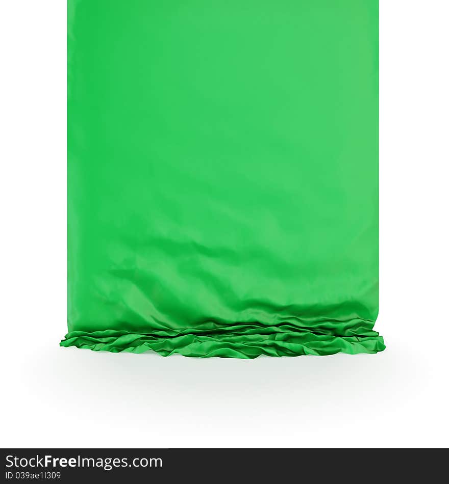 Green silk drapery. Isolated on white background.