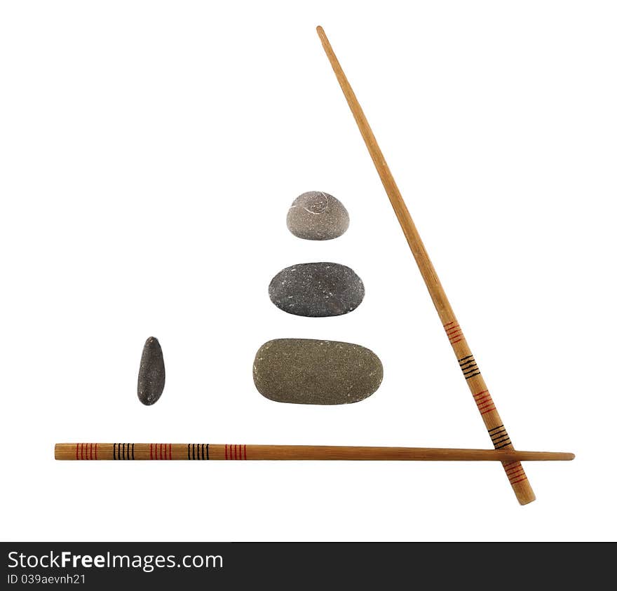 Chopsticks and stones isolated on white background