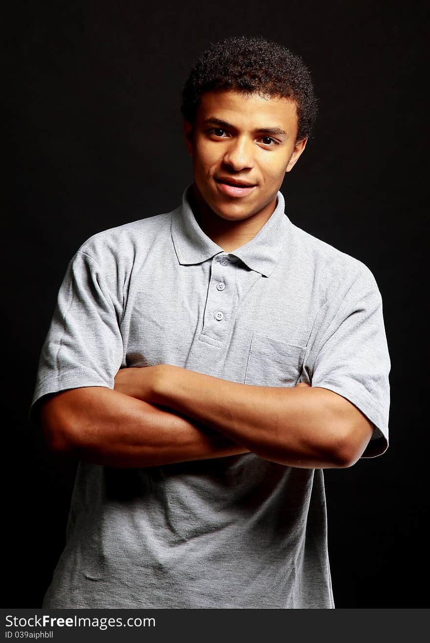 Closeup portrait of a handsome young man over a white background