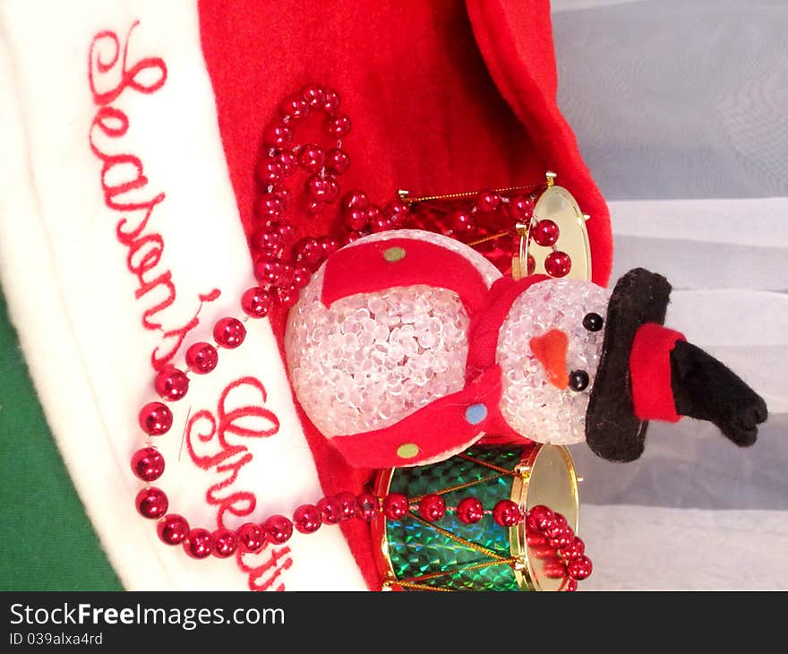 Snowman decoration on Christmas stocking