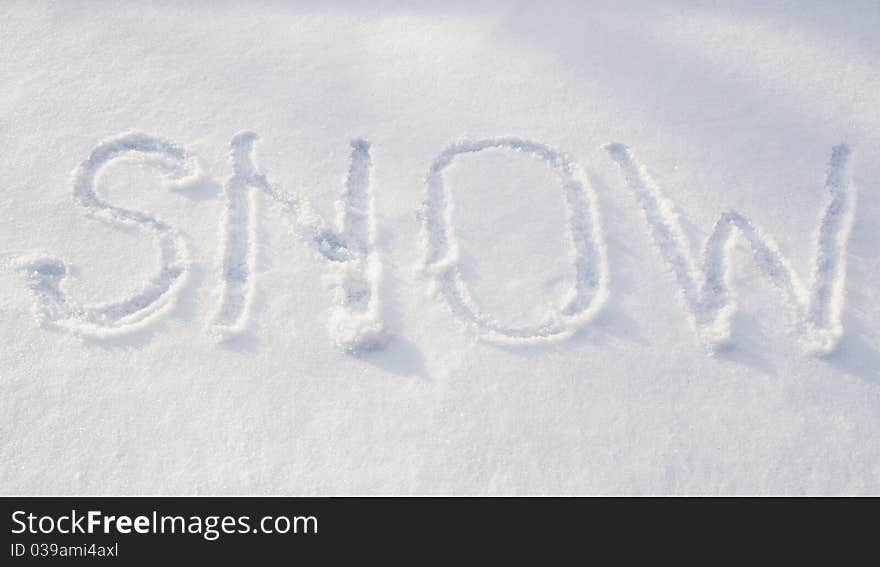 Relief inscription on the white snow about snow. Relief inscription on the white snow about snow