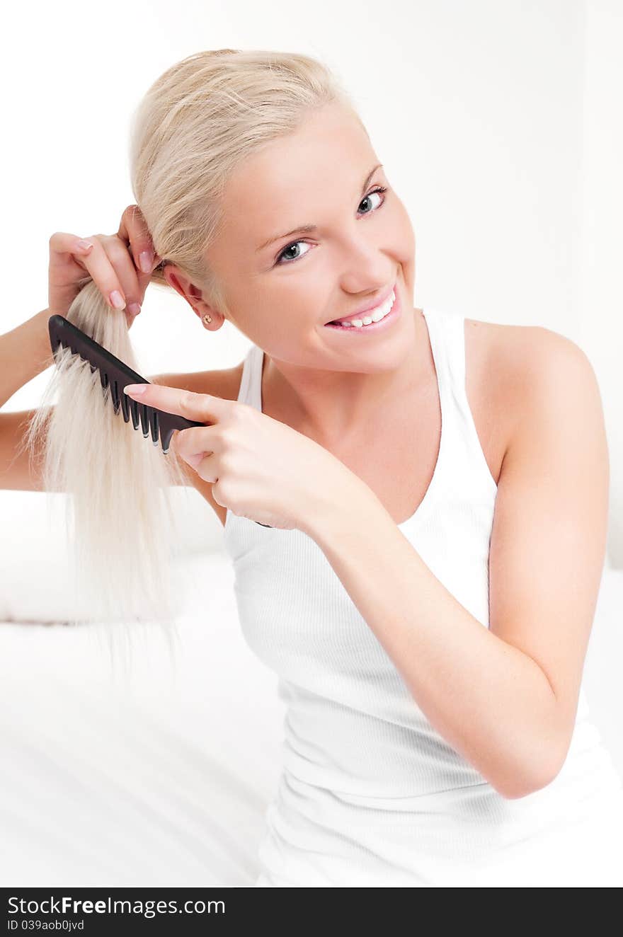 Woman Brushing Hair