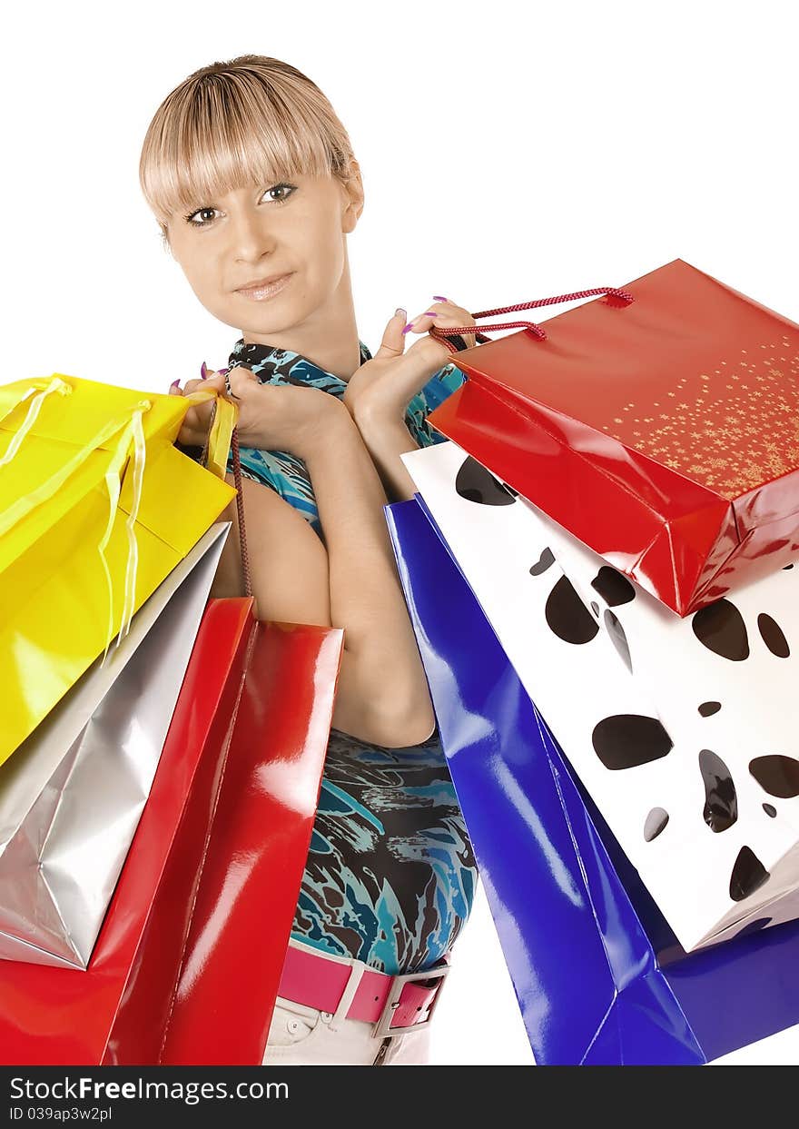 Portrait young adult girl with colored bags. Portrait young adult girl with colored bags