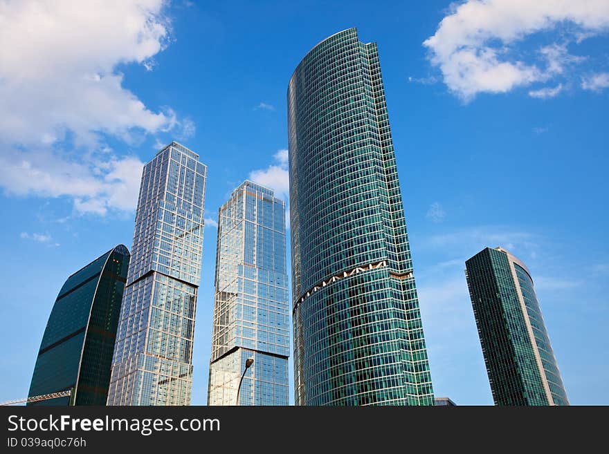 Skyscrepers in business centre on a sky background