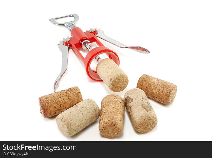 The corkscrew and wine stoppers are isolated on a white background