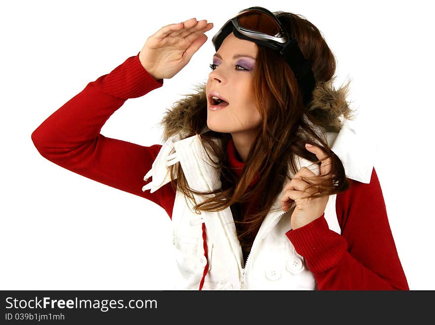 Portrait of a happy young girl snowboarding.