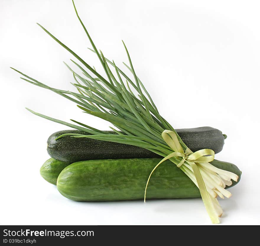 Bunch green onions cucumbers and zucchini