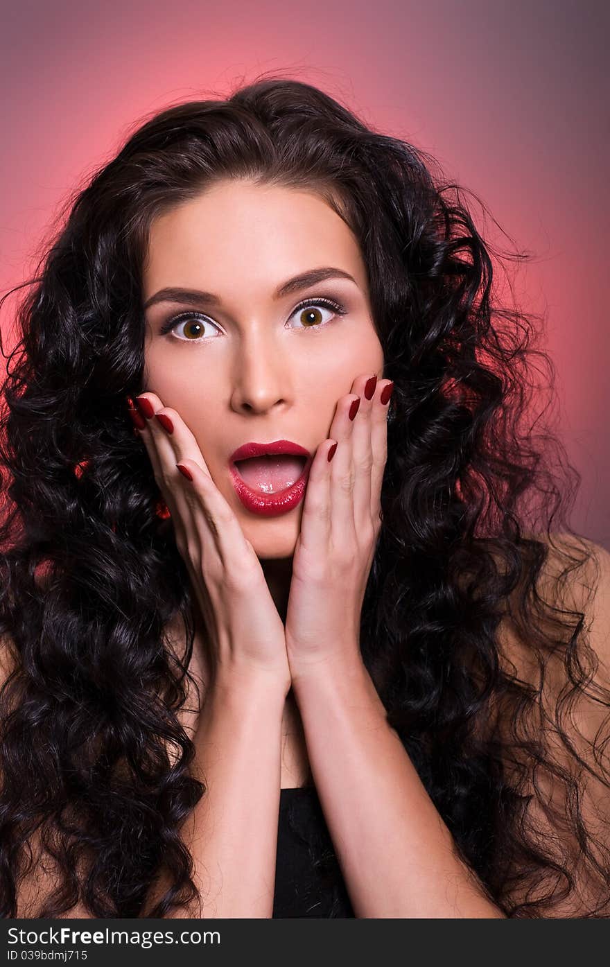 Portrait of young beautiful brunette screaming woman