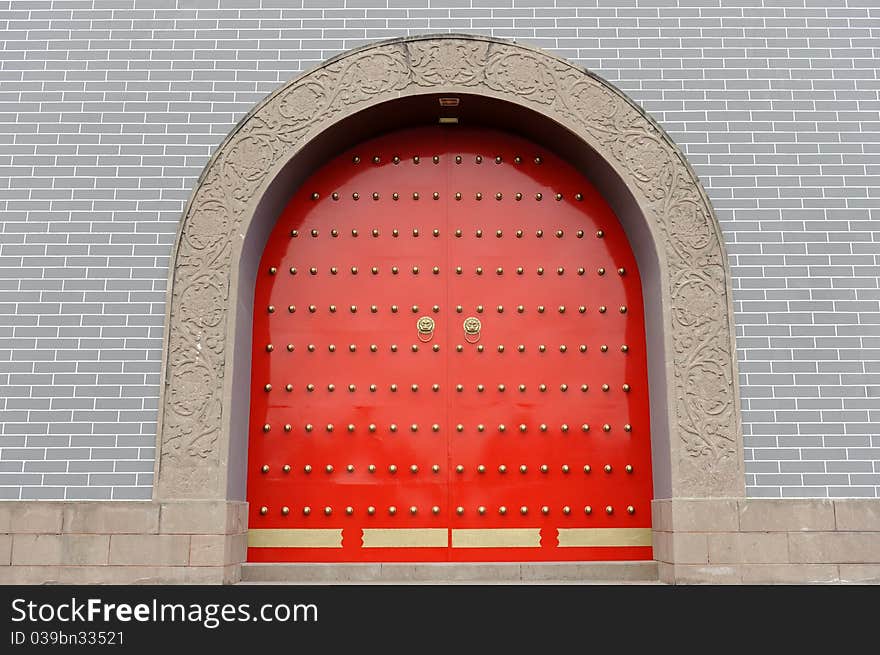 A chinese traditional grand red gate. A chinese traditional grand red gate