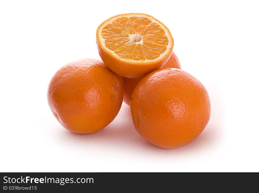 Fresh oranges isolated on white background