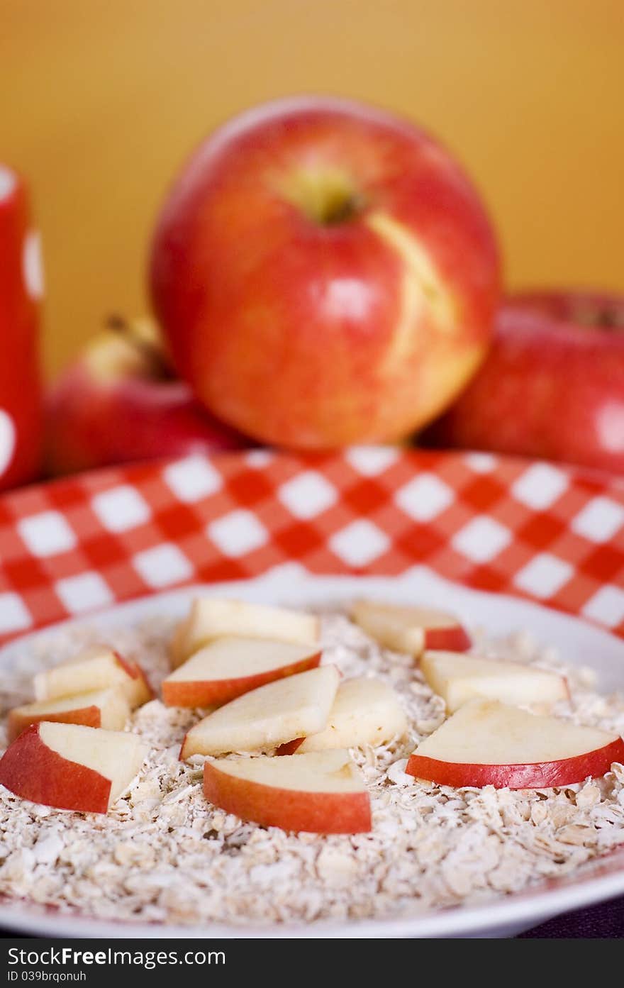 Cereals and red apples in bowl. Cereals and red apples in bowl