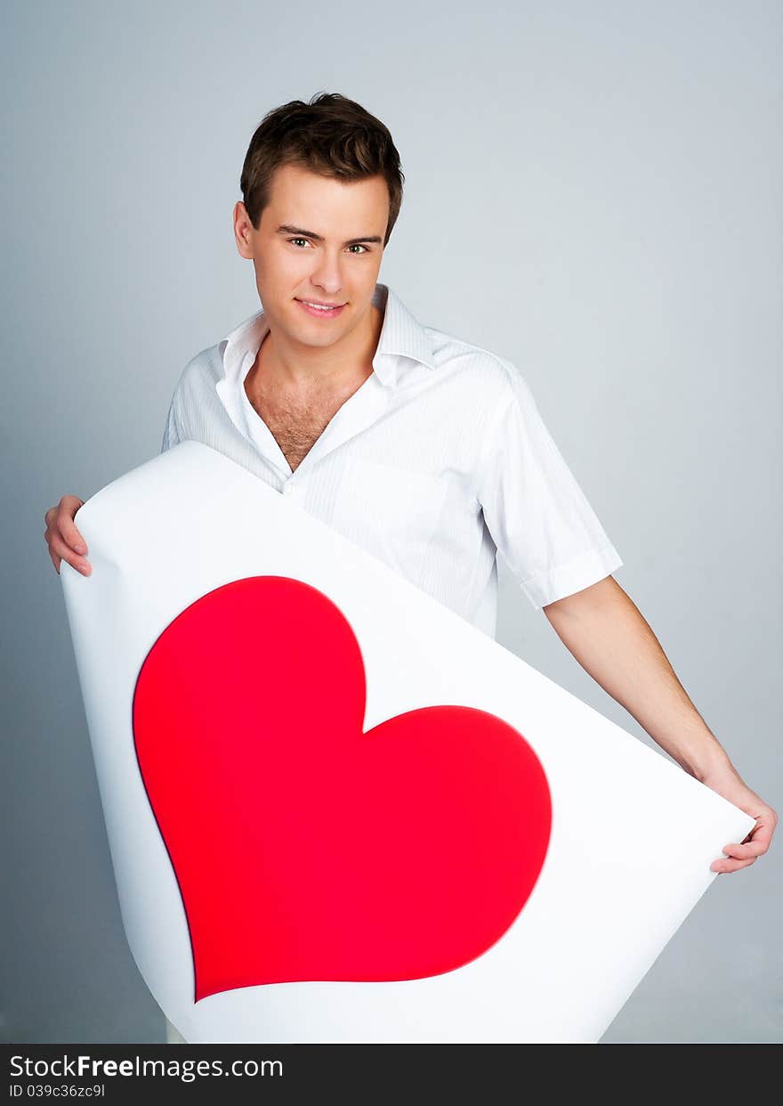 Man Holding A Red Heart