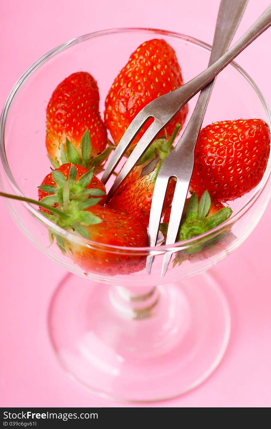 Take a strawberry - use forks