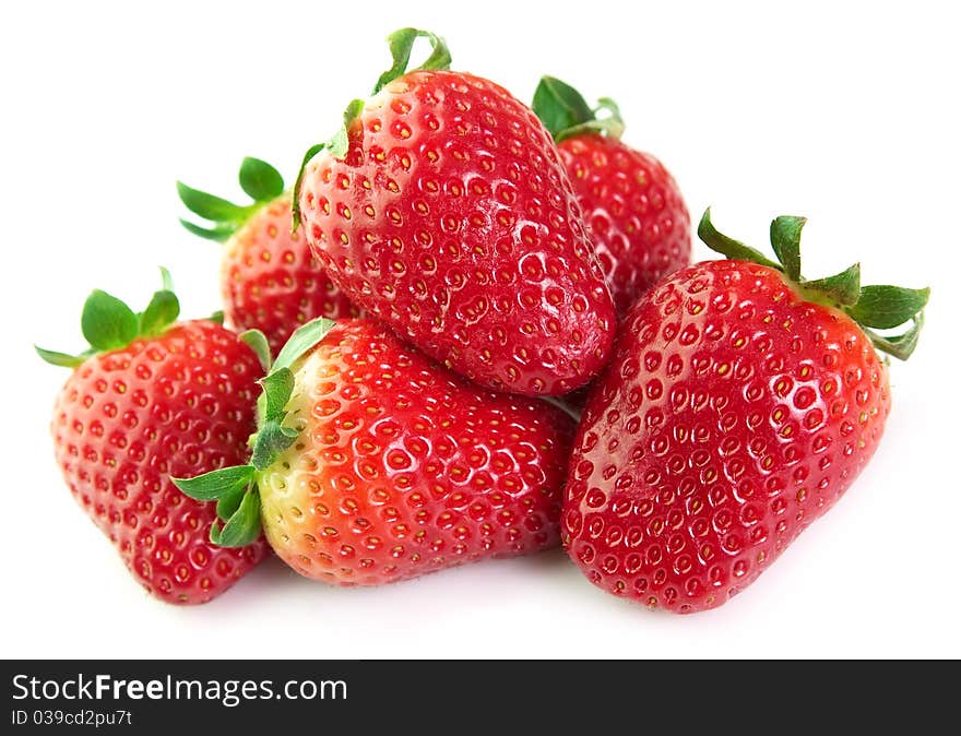 Juicy strawberries isolated on white background