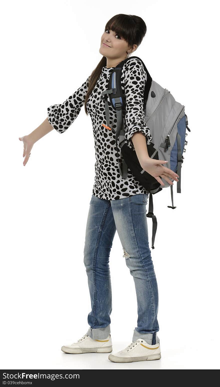 Young student with his backpack, the picture is done in studio, isolated on white. Young student with his backpack, the picture is done in studio, isolated on white