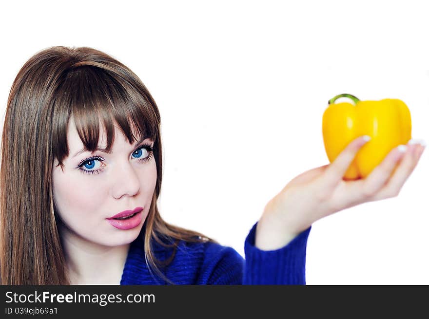 Young woman with yellow paprika. Young woman with yellow paprika