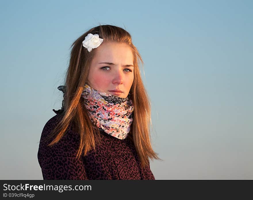 Portrait of a beautiful girl in the cold