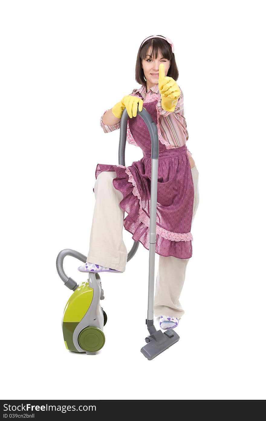 Young adult woman with vacuum over white background