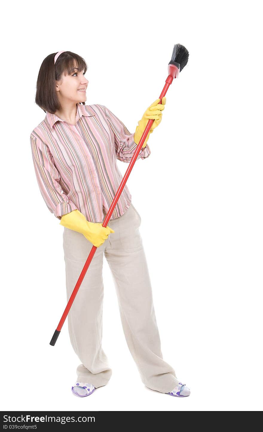 Young adult woman doing housework. over white background. Young adult woman doing housework. over white background