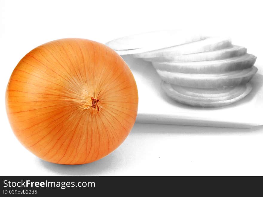 Isolated fresh onions on dish with black and white color