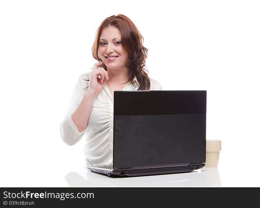 Beautiful girl uses a laptop and shows the gesture is a good idea