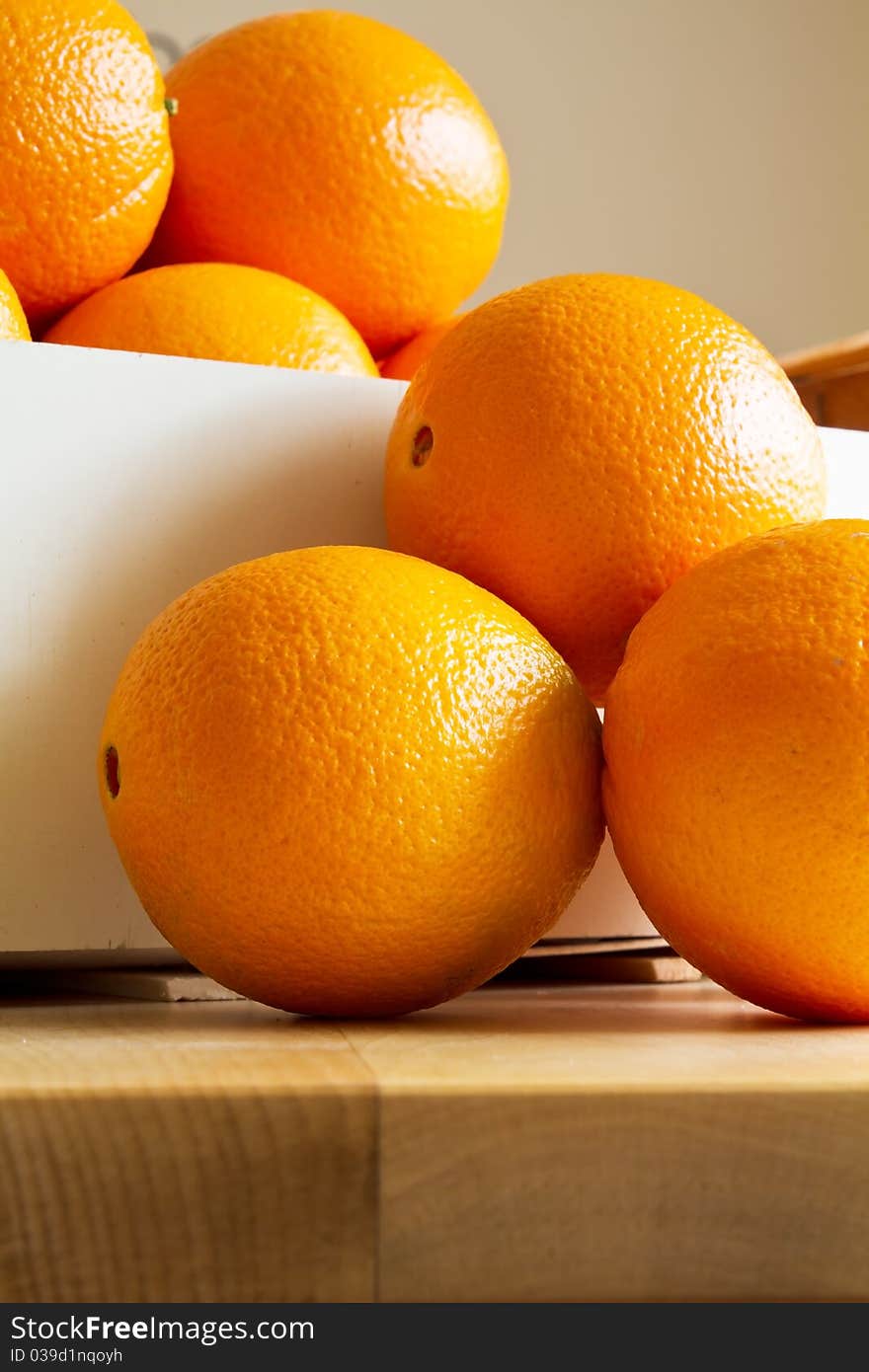 Fresh Oranges in a wooden box, Closeup, Format Filling