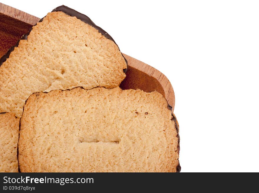 Biscuit dough with chocolate in a wooden bowl. Biscuit dough with chocolate in a wooden bowl.