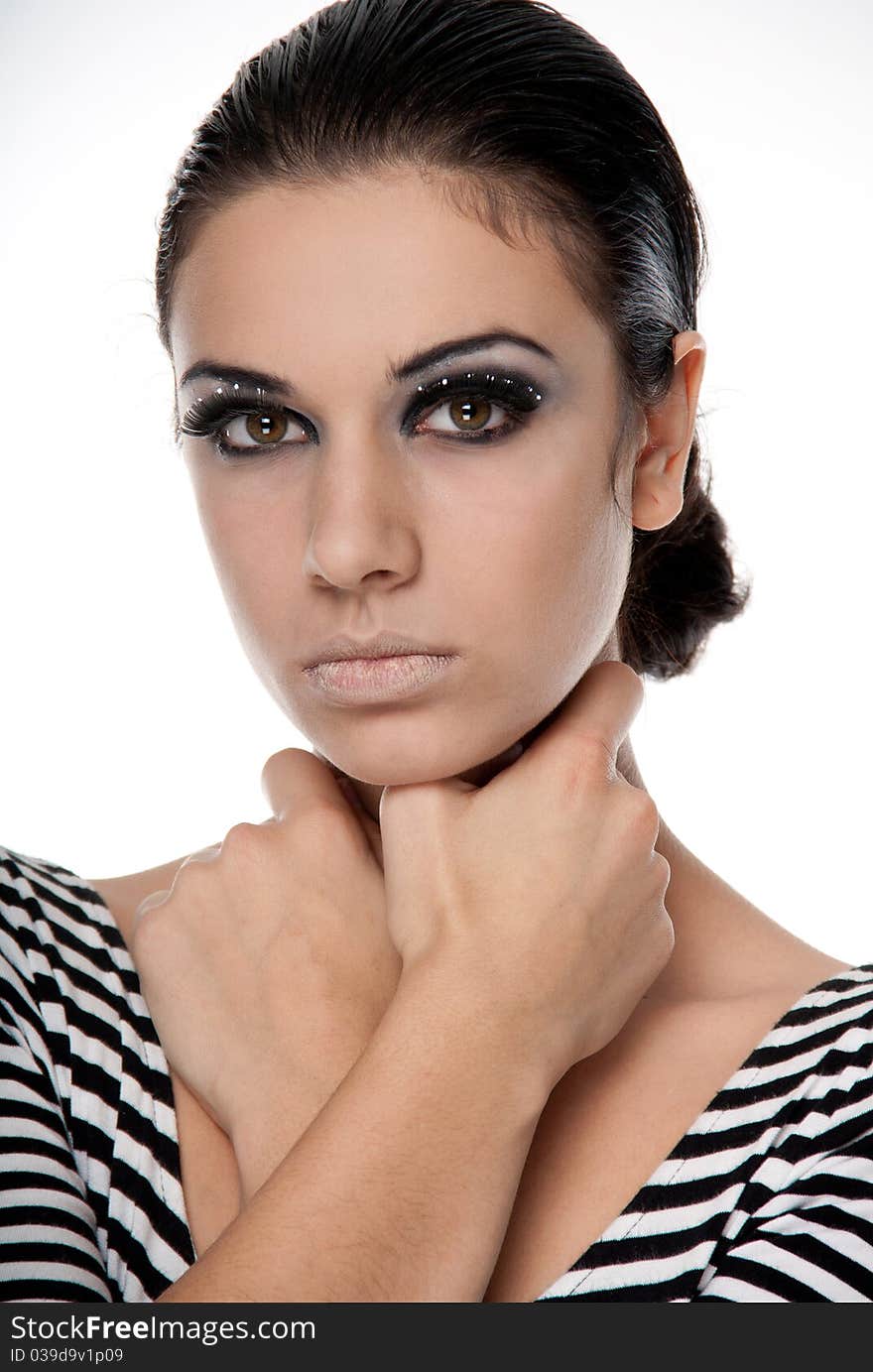 Studio shot of sensual young woman with bright make-up and black frame