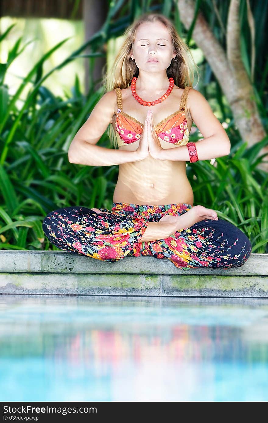 Young beautiful woman meditating on natural background. Young beautiful woman meditating on natural background