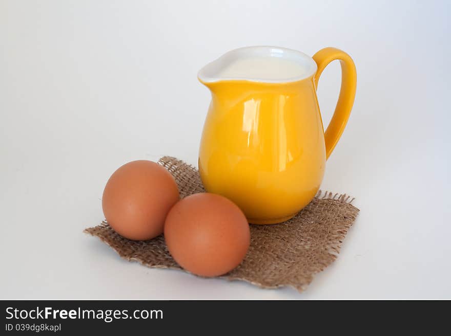 Pitcher of milk and eggs