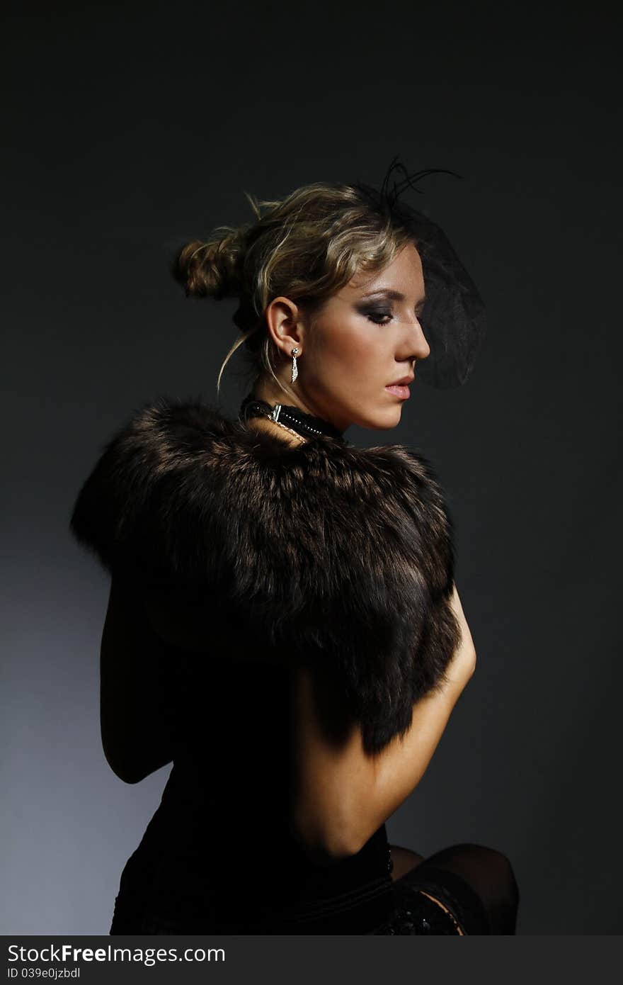 Beautiful Woman In A Fur Mantle