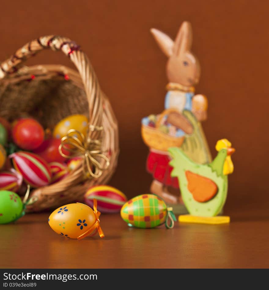Basket full of Eastern eggs, bunny and chicken, focus on orange egg. Please see other easter images. :). Basket full of Eastern eggs, bunny and chicken, focus on orange egg. Please see other easter images. :)