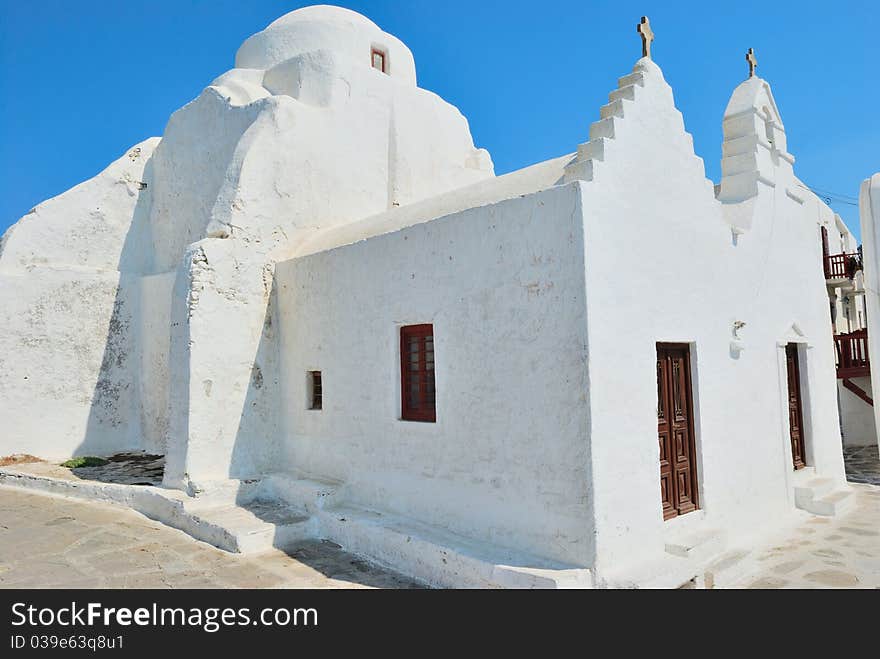 Mykonos white church with blue sky