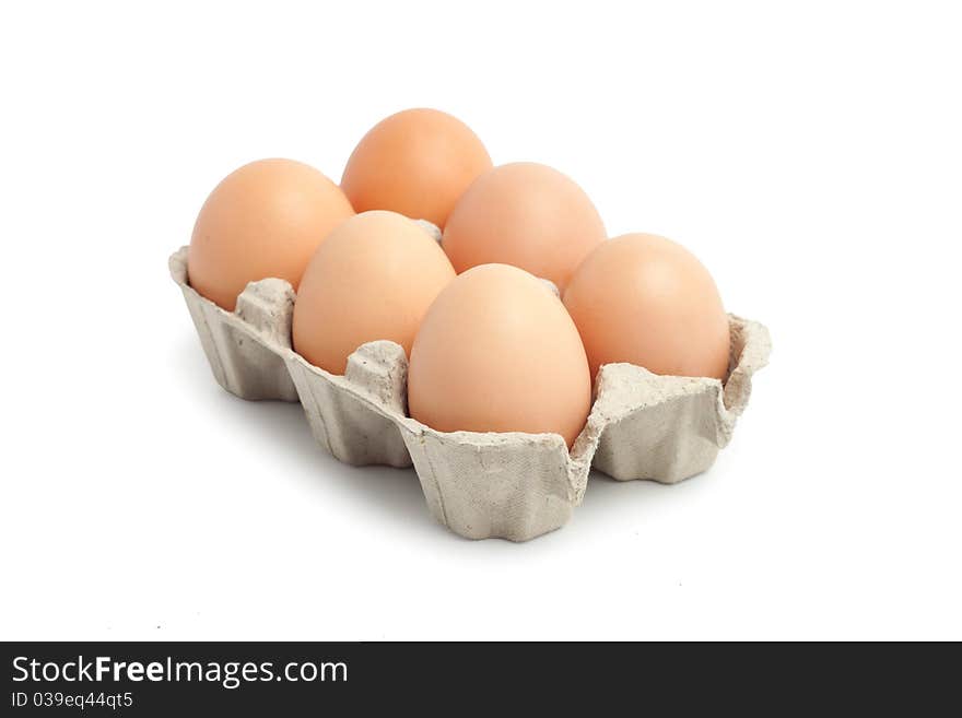 Eggs in box isolated on white background