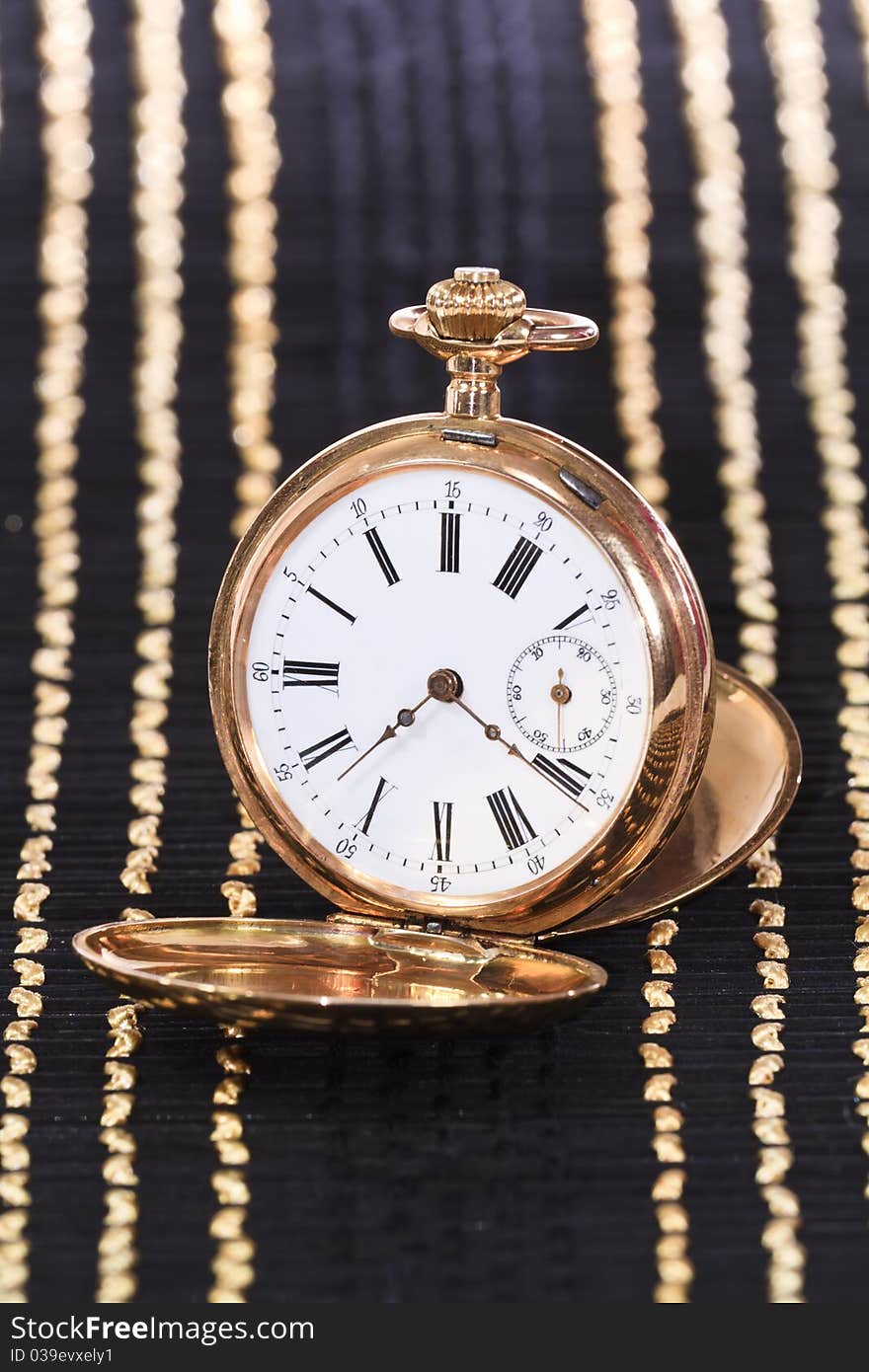 Antique gold pocket watch with diamonds. Antique gold pocket watch with diamonds