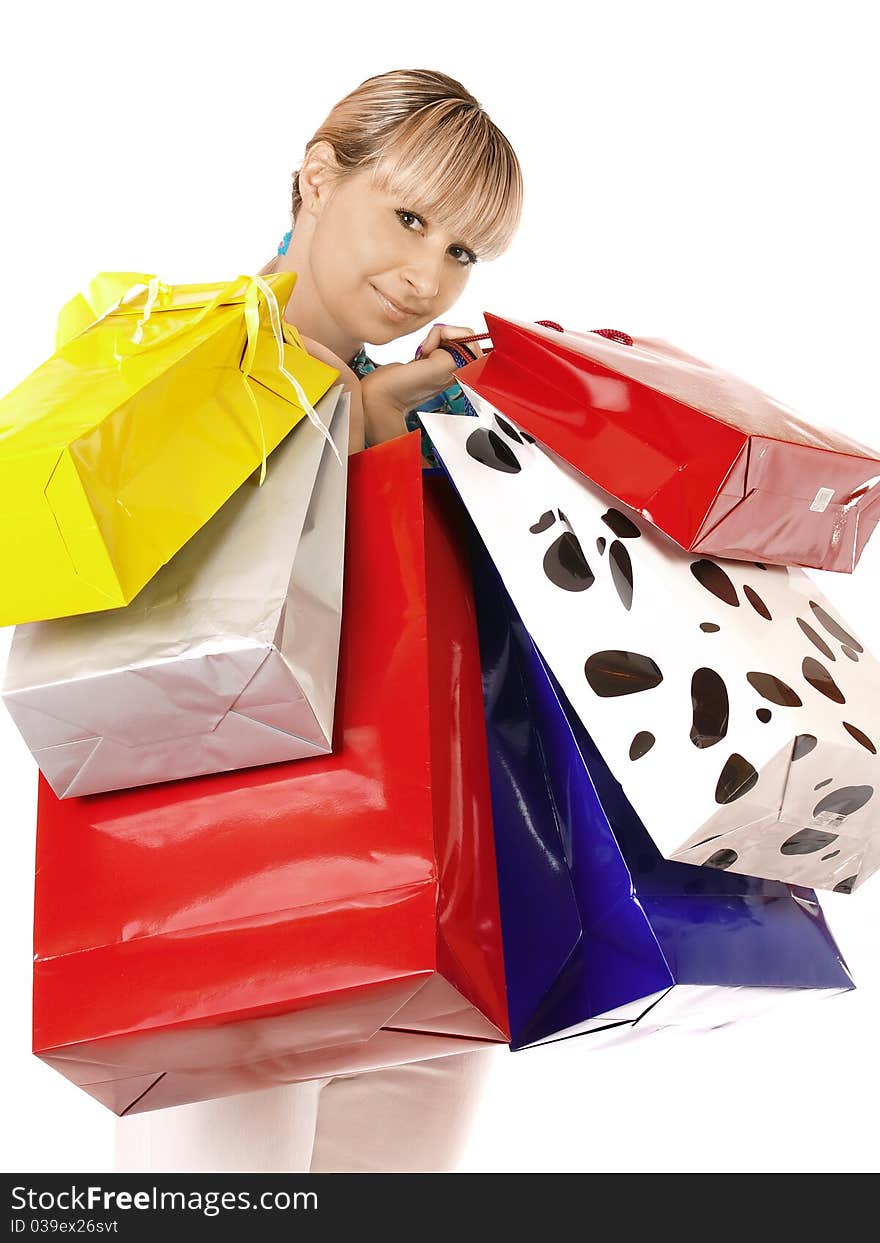 Portrait young adult girl with colored bags. Portrait young adult girl with colored bags