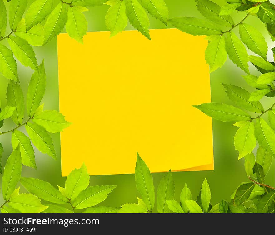 Yellow Post It Not With Green Leave