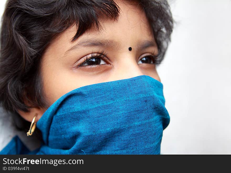 Portrait of Cute Indian Little Girl Looking Somewhere. Portrait of Cute Indian Little Girl Looking Somewhere