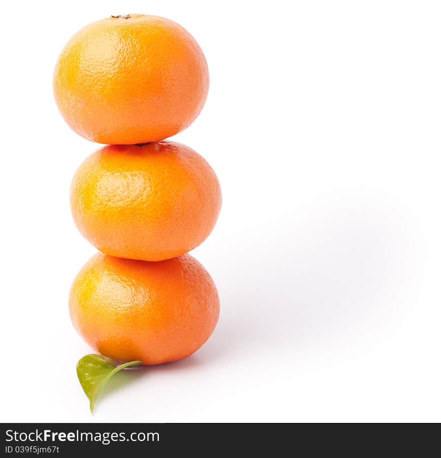 Mandarin fruit tower on white background