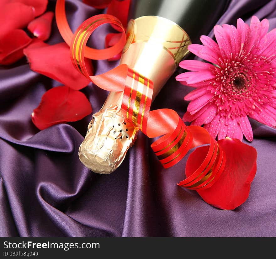 Wine and flower on a silk fabric