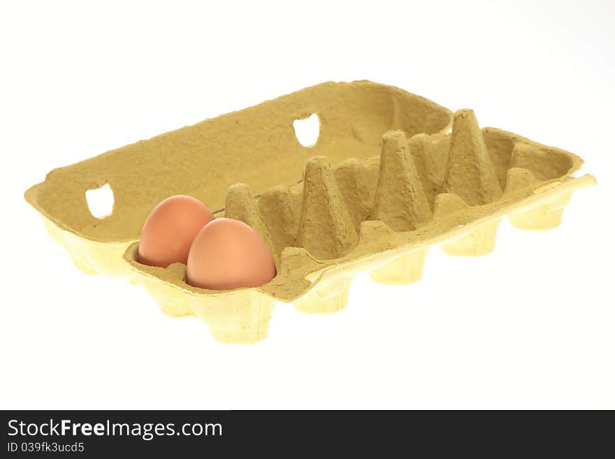 Eggs in box isolated on a white background