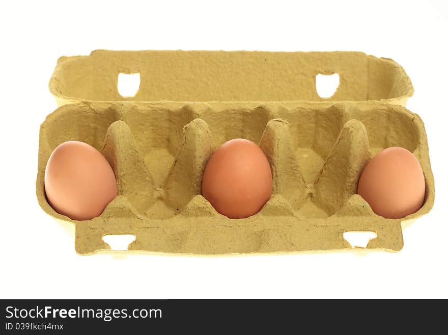 Eggs in box isolated on a white background