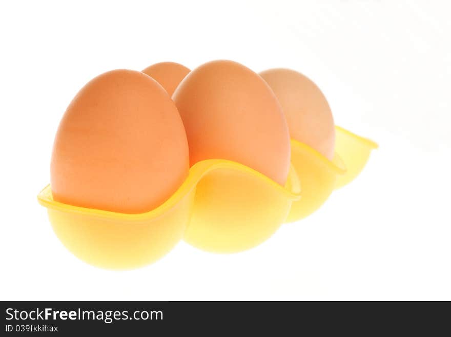 Eggs in box isolated on a white background