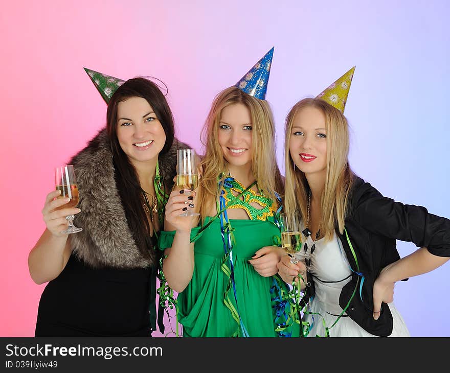 Three beautiful woman with glasses of champagne