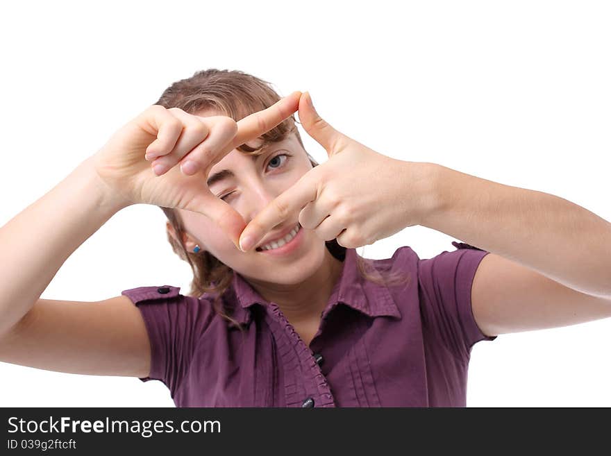 Young woman making a frame with her hand isolated