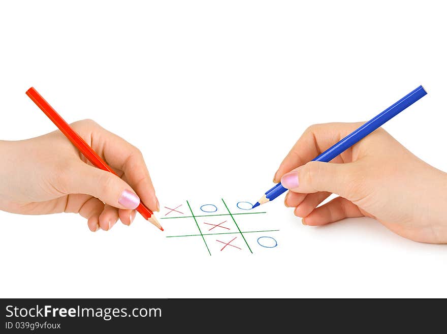 Hands with pencils and game isolated on white background