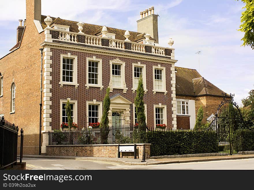 Exterior of family house surrounded by gardens. Exterior of family house surrounded by gardens